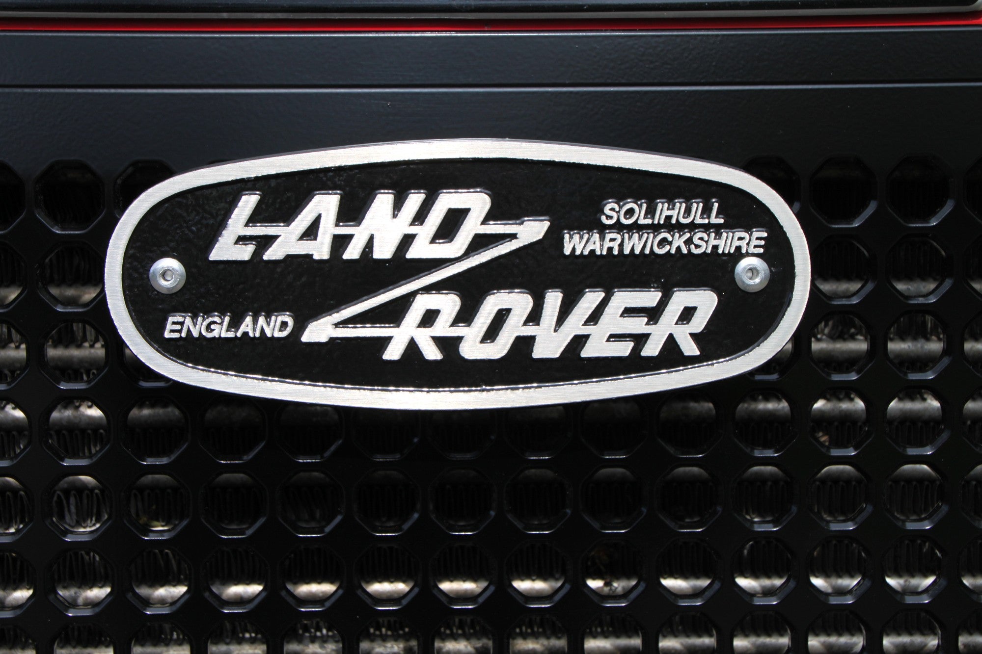 Defender Front Grille (w/ cutout for manual bonnet latch) - for Land Rover Defender 90/110/130 (solid aluminum)