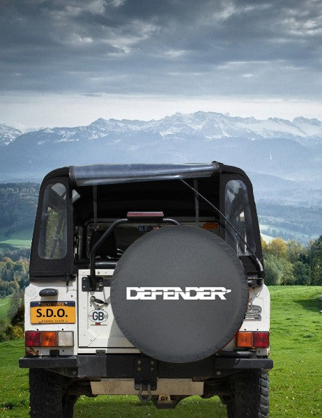 "DEFENDER" Tire Cover (soft vinyl) - for Land Rover 90/110/130 [also fits L663]