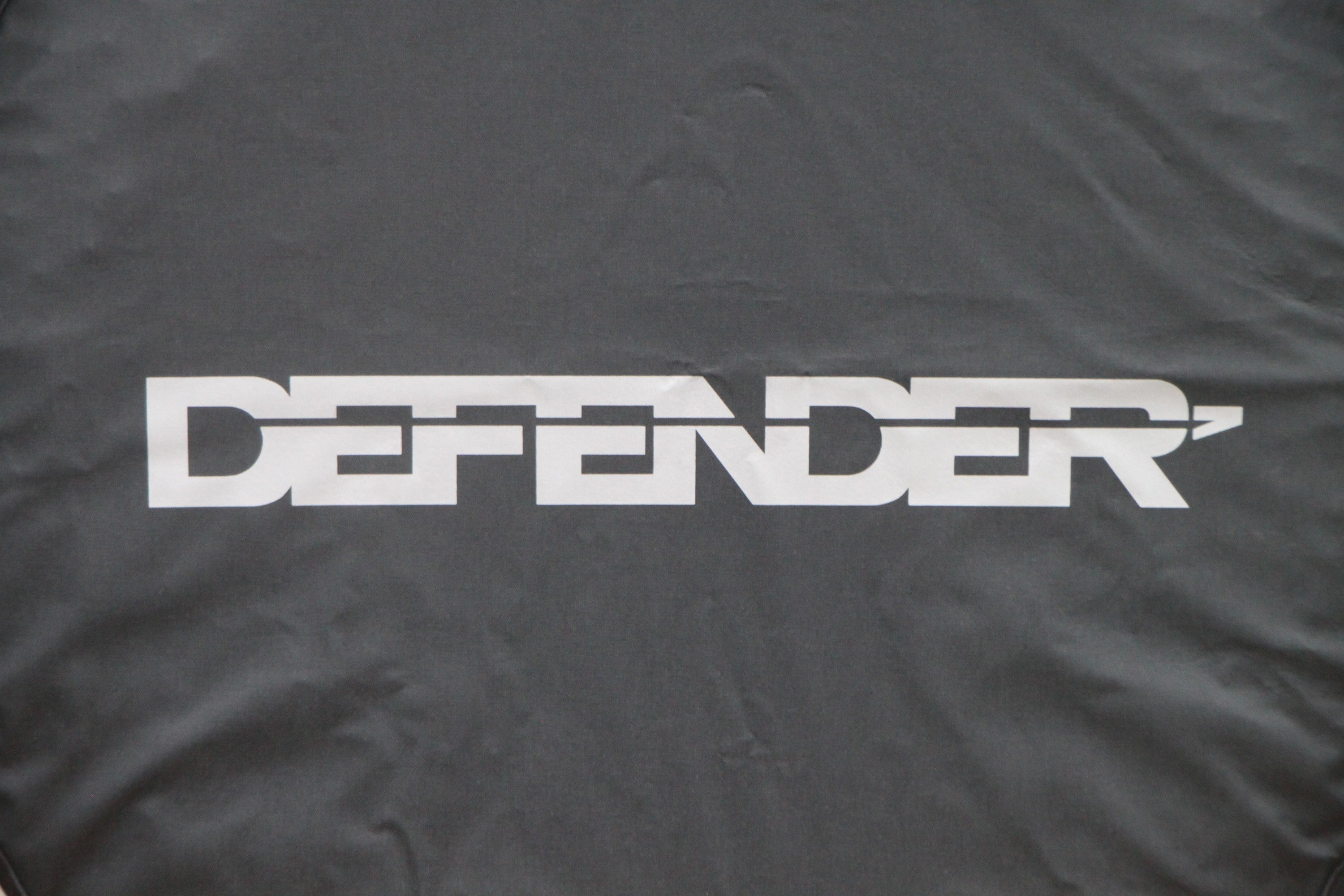 "DEFENDER" Tire Cover (soft vinyl) - for Land Rover 90/110/130 [also fits L663]
